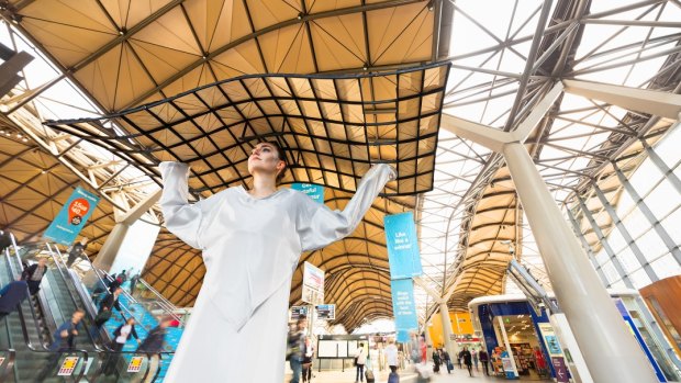 Infrastructure becomes wearable art at Southern Cross Station. Outfit by students Madeleine Hurst, Melanie Gordan and Christian Santos. 