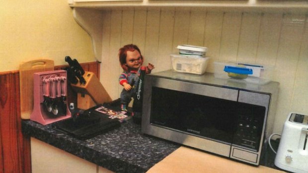 Photos taken by police inside Lilley's home show several Chucky dolls. 