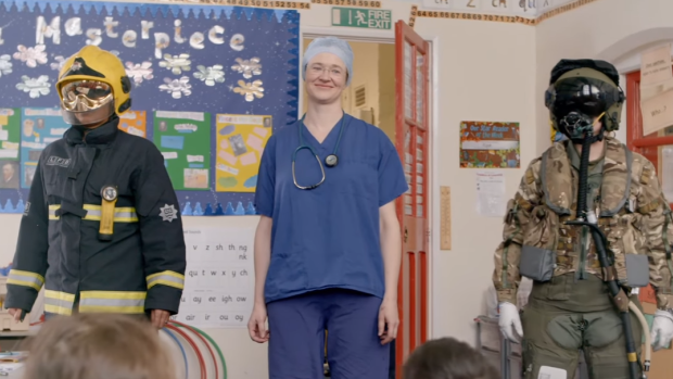 A female firefighter, surgeon and fighter pilot surprise schoolchildren in the Upworthy video. 