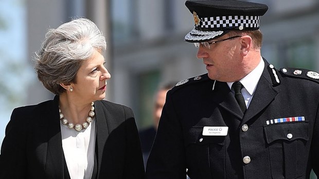 Britain's Prime Minister Theresa May meets Chief Constable of Greater Manchester Police Ian Hopkins.