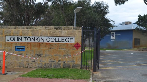 A John Tonkin College teacher, who lent a thumb drive containing "extremely graphic" photos to a student, is no longer teaching students.