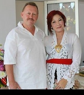 Murdered Australian businessman Robert Ellis with his wife, Noor.