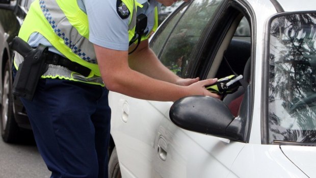 A man has allegedly blown more than four times over the limit after police said they found him asleep at the wheel in Brisbane on Saturday morning.