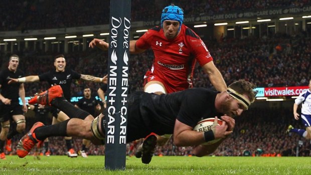Late flurry: Kieran Read dives over for the All Blacks.