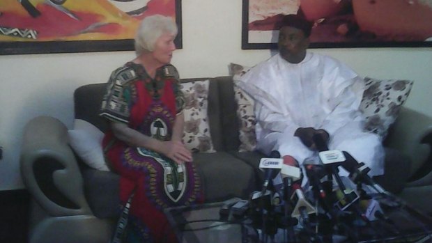 Jocelyn Elliott with Niger President Mahamadou Issoufou.