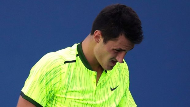 Stomach soreness has put the rest of Tomic's season in doubt. 
