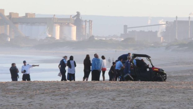 Emergency services at Wollongong City Beach, where a man drowned.
