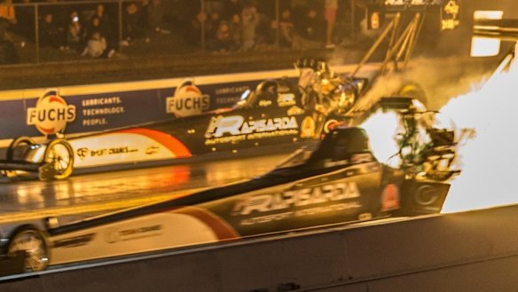 Top fuel racer bursts in to flames and wins anyway at Winternationals