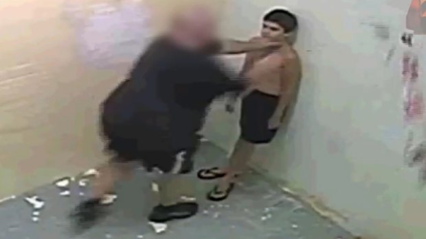 Dylan Voller being manhandled by staff at the Darwin facility.