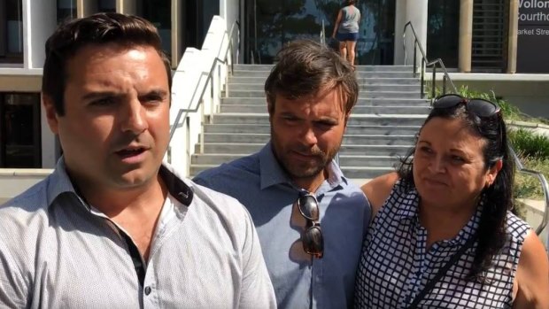 Matthew Domio (left) pictured with his brother Shane and mother Julie Morgan, speaks to the media outside court after his acquittal.