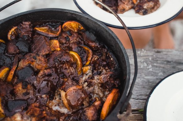 Campfire chocolate orange hot cross bun bread and butter pudding.