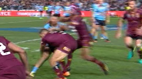 Impact: Johnathan Thurston hits James Tedesco.