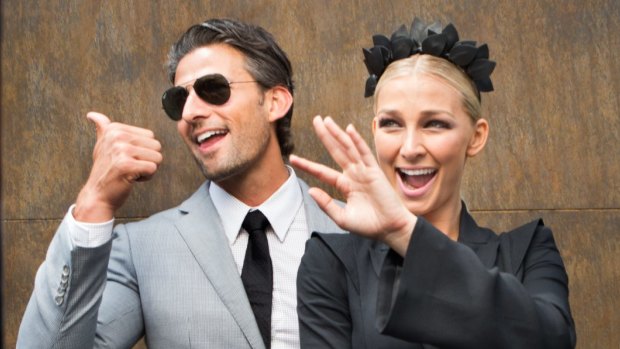 Fashionable: Australia's first bachelor Tim Robards and his chosen one Anna Heinrich at Derby Day last year.
