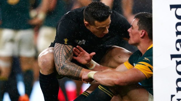 Jesse Kriel of South Africa is consoled by Sonny Bill Williams after the All Blacks beat the Springboks to advance to the 2015 Rugby World Cup final.