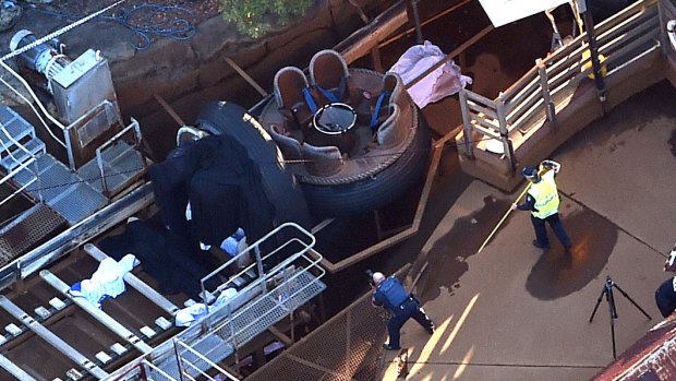 The scene at the Thunder Rapids ride after the accident.