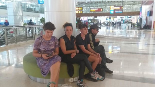 The four Australians - Tom Baxter, 37, Cheryl Melinda Davidson, 36, Danielle Joy Hellyer, 31, and Ruth Irene Cobbold, 25 - who are being deported from Indonesia pictured at Makassar airport after they had left West Papua. 
