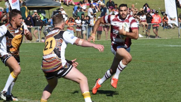Committed: Greg Inglis in action at the Koori Knockout last year. 