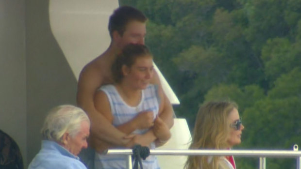 Mark Simonds (front left), executive chairman of the ASX-listed Simonds Group and his wife Cheryl (front, right) with Hannah Fox (centre) on board the Lady Pamela moored on the Clarence River, in Yamba.