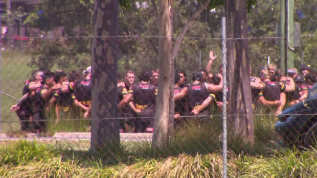 Panthers players form a huddle for Jarome Luai at training on Saturday as he informs them of his decision to leave.