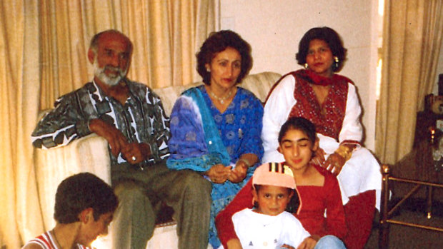 Rubina Nawabi (back right in red and white) pregnant with her second child, with Haji-Daoud Nabi (back left) in Christchurch about 15 years ago. Rubina and her family had plans to stay at Haji-Daoud’s house before he was killed.  