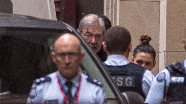 Cardinal George Pell arrives at the Supreme Court on Wednesday morning.