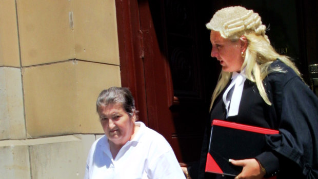 Maria Gazdovic leaving the Supreme Court with Nicola Gobbo.