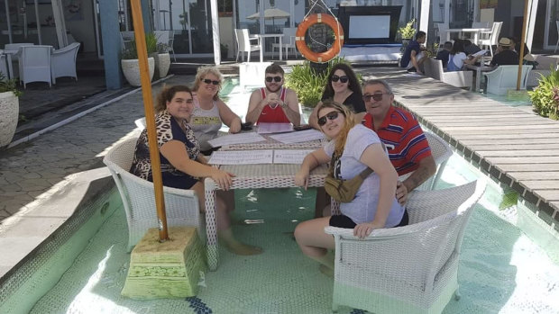 Garry Kirstenfeldt (far right, red and blue shirt) pictured with family.