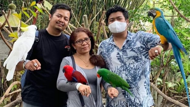 Ni Luh Erniati pictured with her sons.