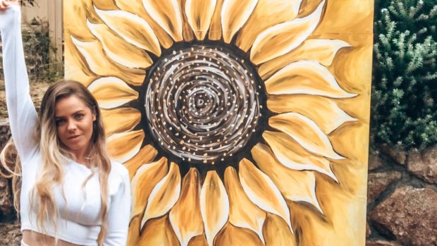 Artist Holly Ogden paints sunflowers all over Perth to spread positivity,