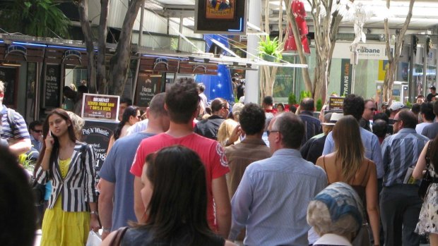 Shoppers browse Brisbane's Queen Street Mall.