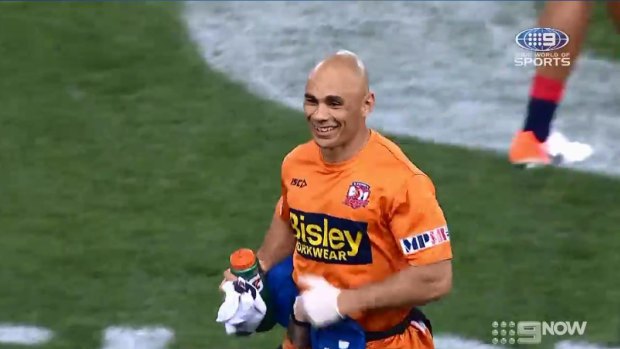 The 14th man: Travis Touma saw the funny side after being hit with the ball in the NRL grand final. Raiders fans didn't.