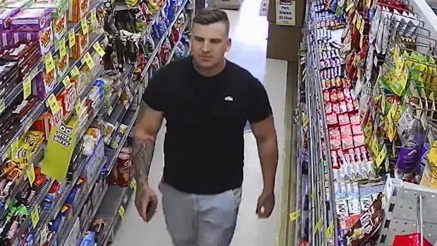 John Dennis Gurney on CCTV in a West Gladstone store where a stolen debit card was allegedly used to make purchases.