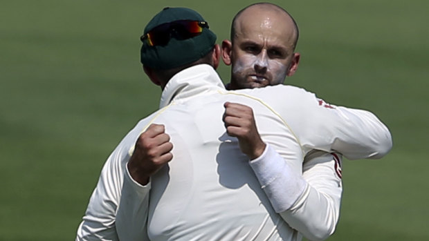 On fire: Nathan Lyon took four wickets in the opening session after Pakistan chose to bat.