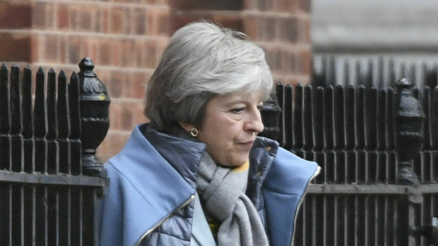 Britain's Prime Minister Theresa May leaves 10 Downing Street, in London, on Friday.