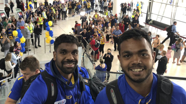 West Coast stars Liam Ryan and Willie Rioli are all smiles at Perth Airport before flying to Melbourne for their first AFL Grand Final on Saturday.
