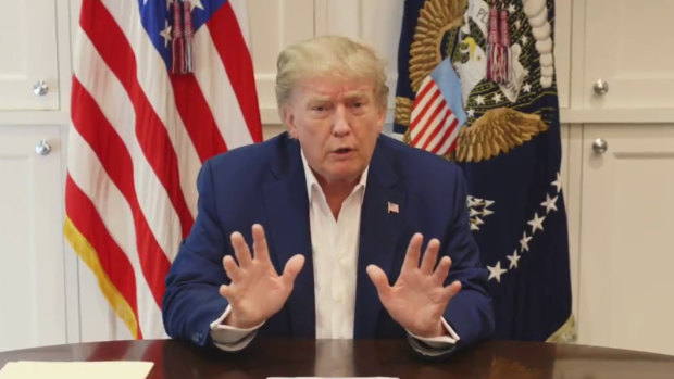Feeling "much better now" ... US President Donald Trump speaks from hospital in a four-minute video.  