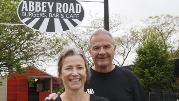 Abbey Road Burgers owner Fabian Prioux (right) does not allow children into the cafe.