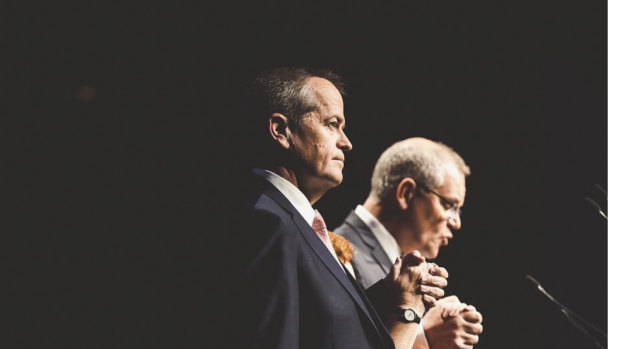 Opposition Leader Bill Shorten, and the Prime Minister of Australia Scott Morrison hold hands during the National Apology to Victims and Survivors of Institutional Child Sex Abuse.