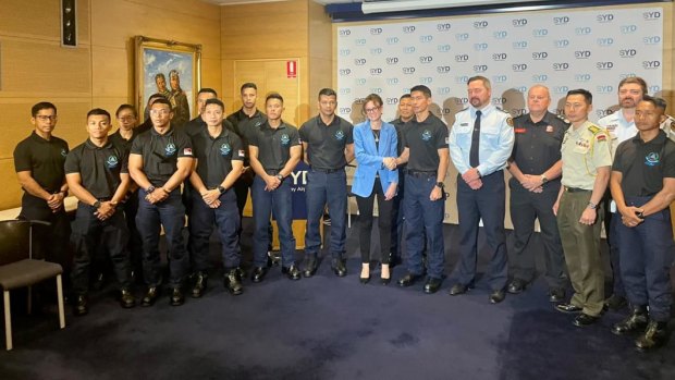 Singaporean water rescue personnel at Sydney Airport on Thursday.