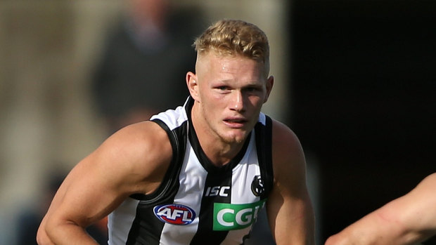 Adam Treloar will be sidelined for Collingwood's season-opening meeting with the Western Bulldogs.