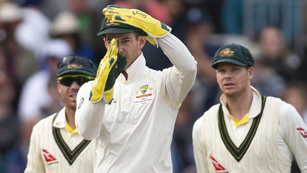 Captain's call: Tim Paine signals his request for a DRS review.