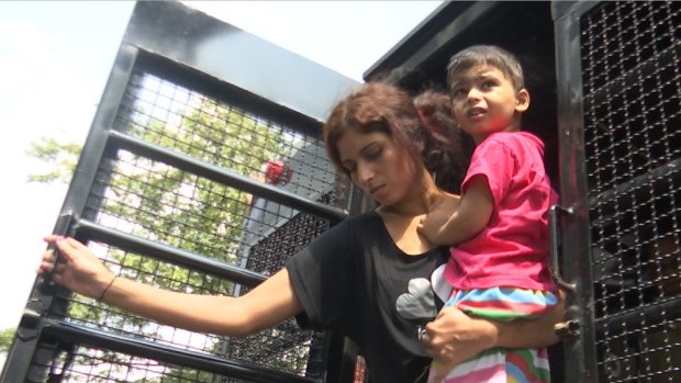 Pakistani Christian refugees arrive at the Immigration Detention Centre in Bangkok, Thailand.