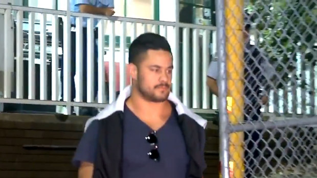 Jarryd Hayne leaving Ryde police station early on Tuesday morning.