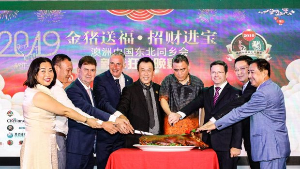 Liberal fundraiser John Caputo (third from left), Liberal MP for Drummoyne John Sidoti (fourth from left) and Liberal member for Oatley Mark Coure (third from right) at the Chinese New Year event.