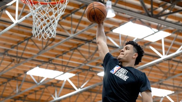 Australian NBA Draft hopeful Josh Green dunks while training at IMPACT Basketball in Las Vegas.