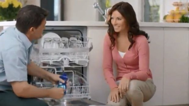 An advert for the Finish cleaning product features a male expert telling a woman how to clean her dishwasher.