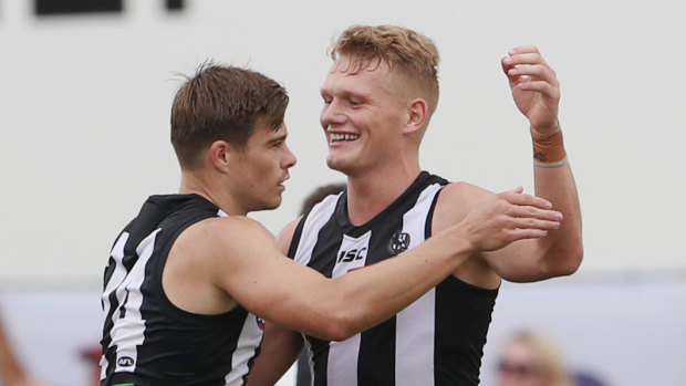 Adam Treloar (right) racked up 42 touches on Monday,