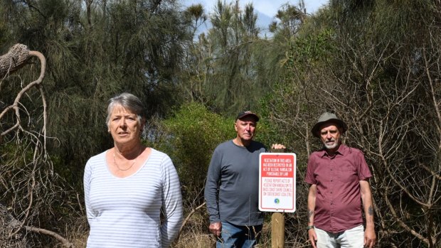 The Dates and Upston at the site of vandalised vegetation at Corinella.