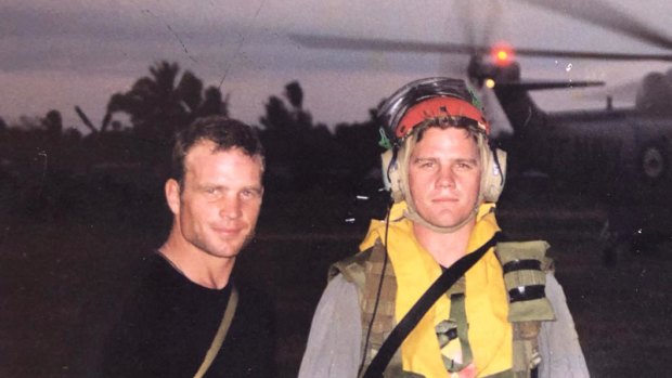 Then Lieutenant Dan Gosling (left) with brother Xavier Gosling who was  on HMAS Success, the main supply ship supporting InterFET, in 1999.