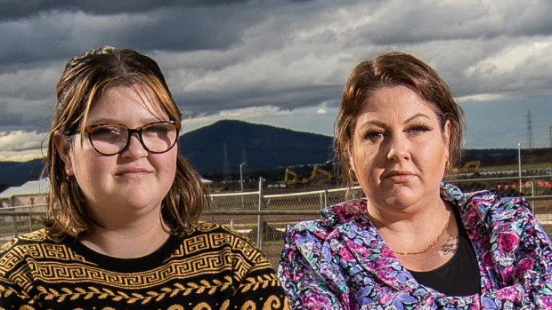 “We’re stuck paying rent and the progress repayments, and we’re still on hold,” said Kate Saha, seen here with her daughter, Armahni.